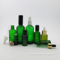 Green glass round essential oil and perfume bottle 100ml